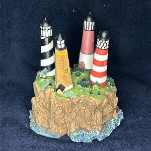 Cheese & Dip Knife Set. 4 Lighthouses nest into a resin base